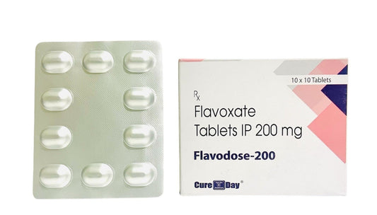 Flavoxate tablets and packaging with Cure Day Healthcare logo on a white background